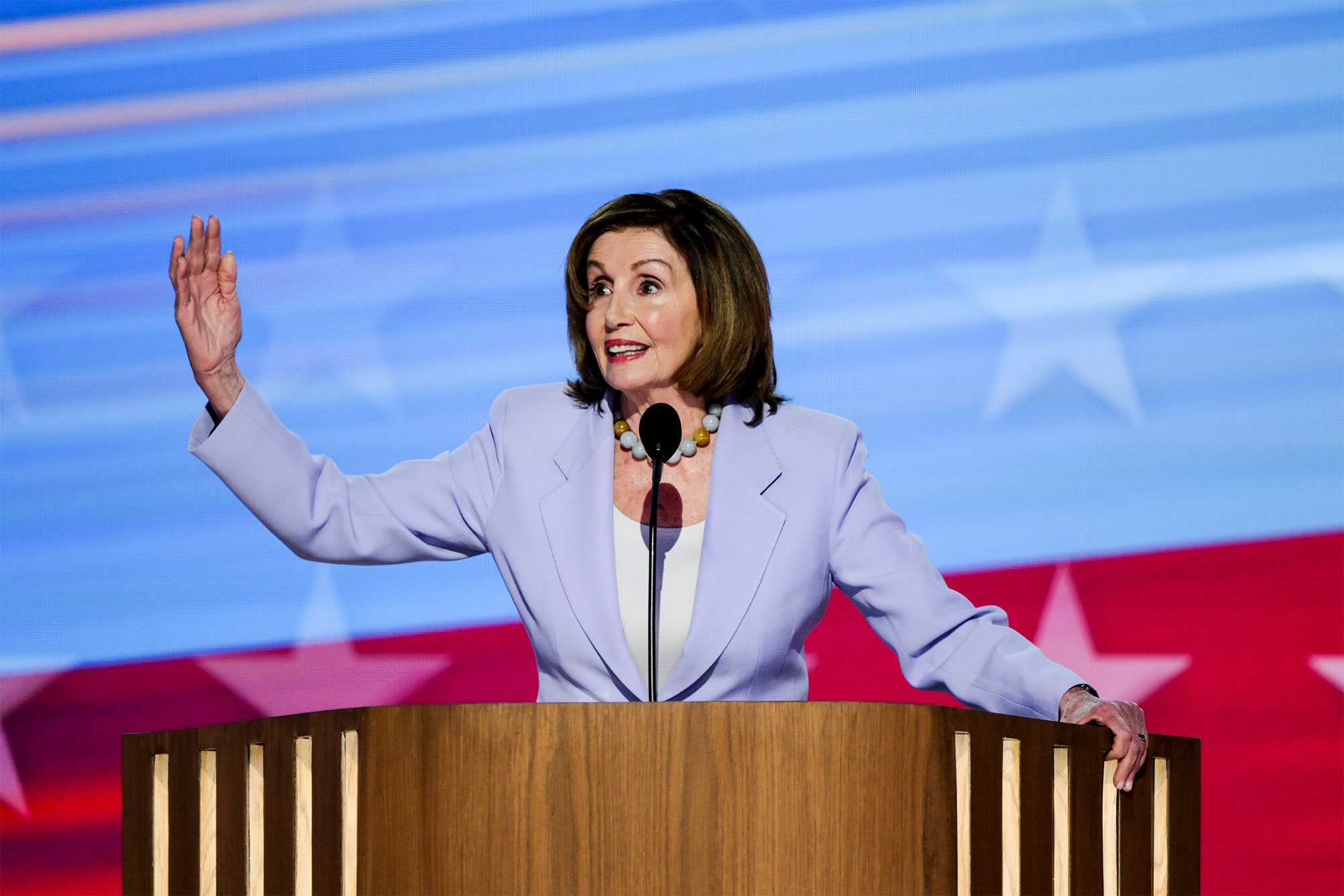 Image may contain Nancy Pelosi Crowd Person Adult Audience Accessories Jewelry Necklace People and Speech